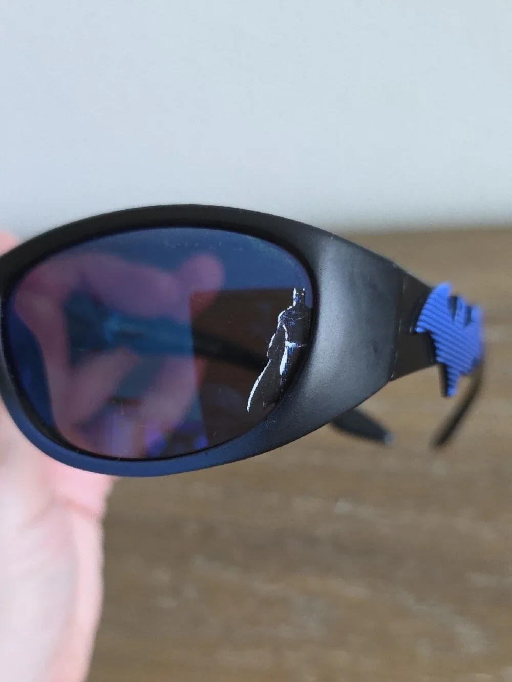 Black Sunglasses with Blue Bat Accent